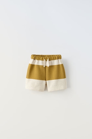 Quần shorts xanh vàng
