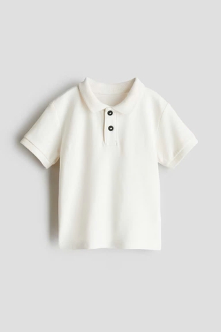 Áo polo trắng / khuy đen HM