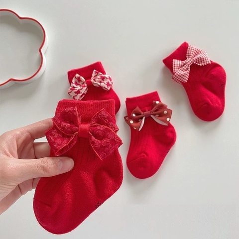 Tất vớ len đỏ đính nơ cao cổ cho bé gái diện tết và noel 𝟎𝟐𝐓𝐋