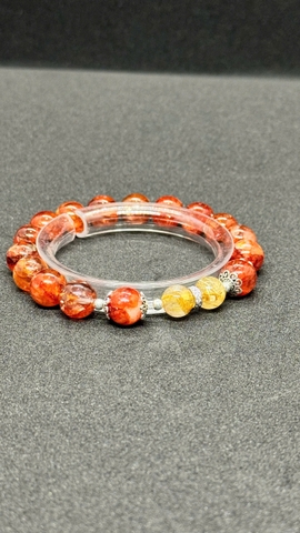 Vòng ưu linh đỏ 10mm mix tóc vàng 5A, charm bạc 925