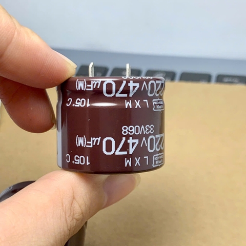 Tụ điện hóa 470uF 220V 220V470uF LXM màu nâu 30x25mm