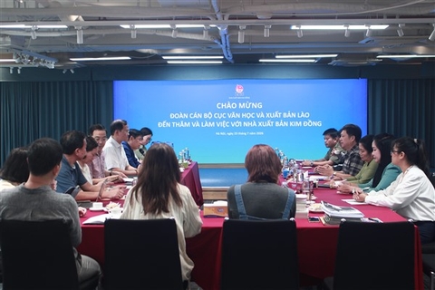 Nhà xuất bản Kim Đồng trao đổi, chia sẻ kinh nghiệm với Cục Văn học và Xuất bản Lào