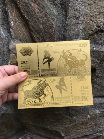 Tiền lưu niệm tờ 100 plastic vàng hình con Trâu Tết / pktn sale