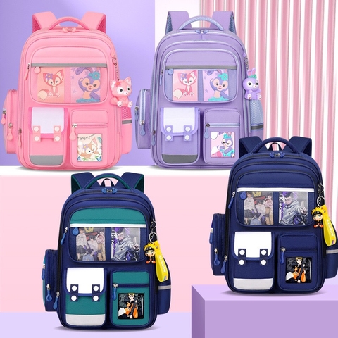 Balo chống gù D600 kèm thú bông treo chống nước họa tiết hoạt hình cho bé [BH: NONE]