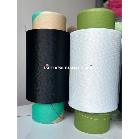 Cuộn chỉ tơ vắt sổ màu trắng, màu đen dùng cho máy may công nghiệp – Sợi 150