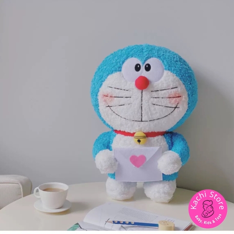 Doraemon cầm bao thư nhồi bông mềm mịn 40cm siêu dễ thương