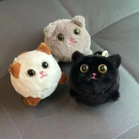Móc khóa Mèo bông dây cót xoay đuôi dễ thương