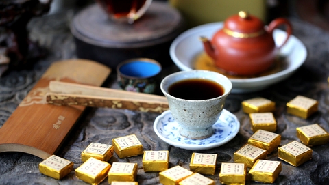 Trà Phổ Nhĩ Chín Tiểu Kim Chuyên câu chuyện trà viên 20 năm tuổi