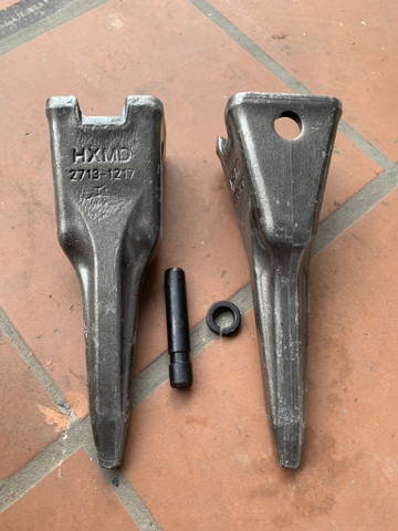 RĂNG ĐÁ DH200-5 DX210 NHỌN ( CÓ KHUYẾT ) - THÉP DẬP - JPS