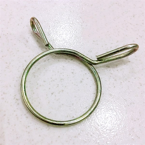 Lò Xo Khóa Ống Thoát Nước Máy Giặt