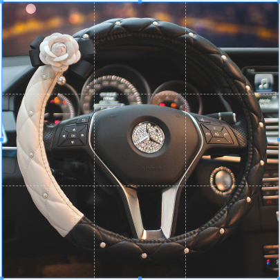 Bọc vô lăng hoa trà da - bọc đen trắng