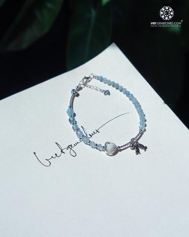 Lắc tay Aquamarine mài giác charm bạc
