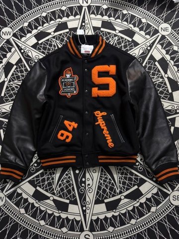 Varsity Supreme đen da bò