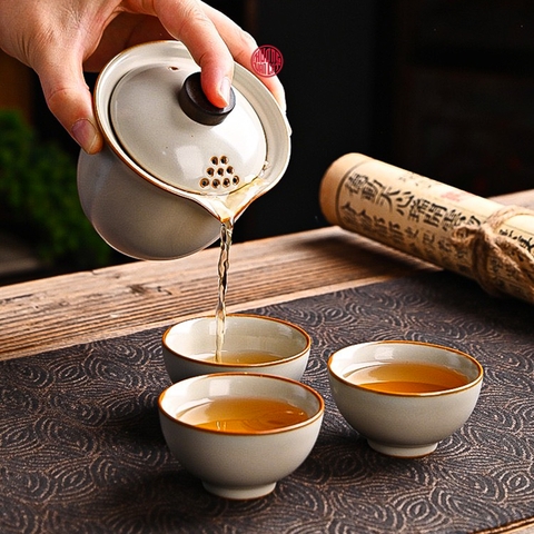 QUÀ TẶNG BỘ ẤM TRÀ DU LỊCH HÌNH HỘP VẢI XÁM GỌN NHẸ