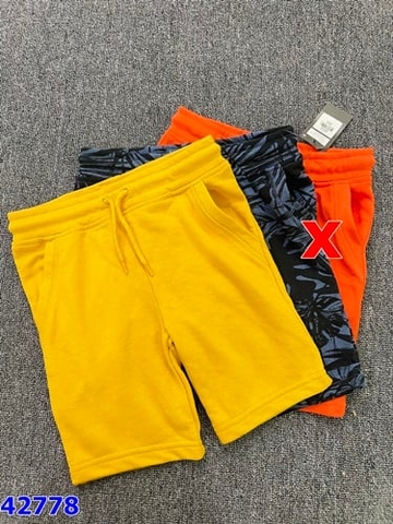 Short Primark vàng - size 5-6y