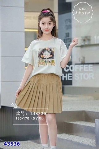 Set váy nâu áo trắng cô gái tóc xù