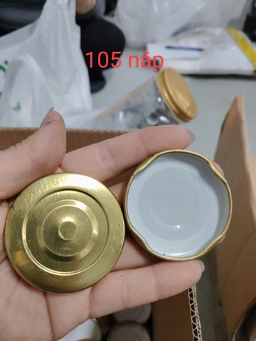 NẮP THIẾC VÀNG ĐẬY CÁC HỦ THỦY TINH