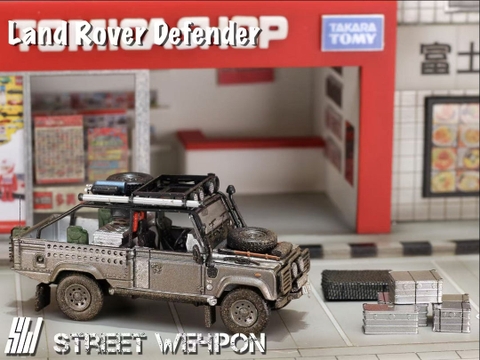 Xe Mô Hình Land Rover Defender/Tomb Raider and Rover Defender Tomb Raider Livery 1:64 DCM (Muddy Version)