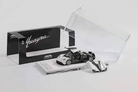 Xe Mô Hình Huayra Coupe 2014 1:64 HKM ( Glacier White )
