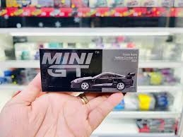 Xe Mô Hình Toyota Supra VeilSide Combat V-II Black LHD 1:64 MiniGT - BOX