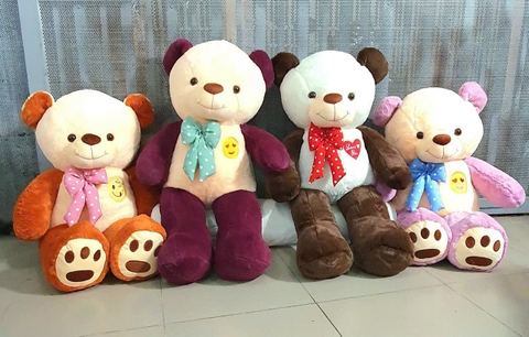 Gấu bông teddy mặt cười thắt nơ
