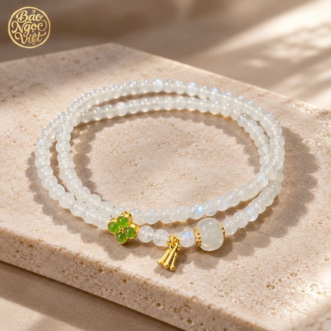 Chuỗi vòng Moonstone mix charm Chuông Vàng, Hồ và Đá xanh 4 cánh 4.8 - 4.95 li