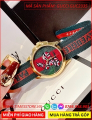 dong-ho-nu-gucci-unisex-mat-ran-vang-gold-day-vai-xanh-do-timesstore-vn