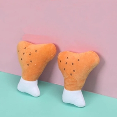 ĐỒ CHƠI ĐÙI GÀ NHỒI BÔNG CHO CHÓ MÈO