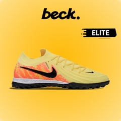 Giày Bóng Đá Nike Phantom GX2 Elite Vàng Gót Cam Đế React Cổ Lửng TF