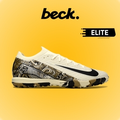 Giày Bóng Đá Nike Mercurial Vapor 16 Elite V1 Vàng Trà Sữa Vạch Đen Đế Rằn Ri Cổ Lửng TF