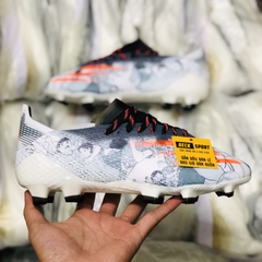 Giày Bóng Đá Adidas X Ghosted.1 Tsubasa Trắng Đen Vạch Cam FG