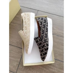 Slip on M**icheal kors logo
