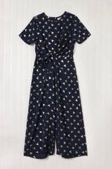 Jumpsuit Oasic hoạ tiết ánh kim thắt eo