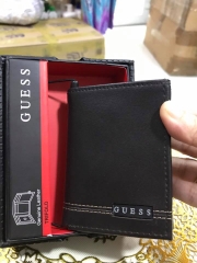 Ví nam hàng da thật hiệu Guess-Reaction-Tommy