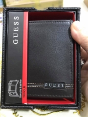 Ví nam hàng da thật hiệu Guess-Reaction-Tommy