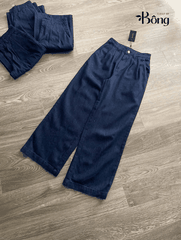 Quần denim màu chàm dáng suông