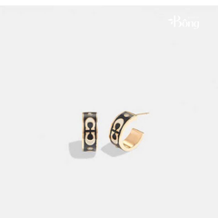 Khuyên tai Coach dư xịn