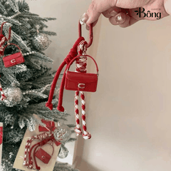 Charm COACH đỏ dư xịn fullbox