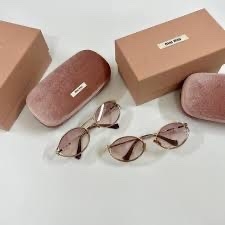 Kính Miumiu gọng khoan không viền