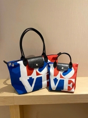 Túi Longchamps canvas series chữ LOVE