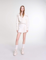 Chân váy Maje xếp ly lệch tweed trắng