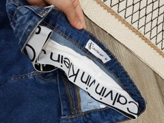 Quần denim CK cạp trắng dáng suông