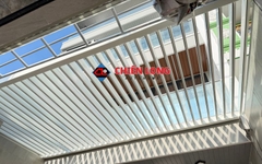 Mái nhôm xếp lật tự động giếng trời | Thi công trọn gói – Báo giá 2026