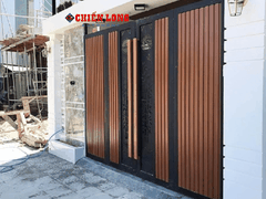 Mẫu cổng 4 cánh ốp nhựa giả gỗ ngoài trời - Phối hoa văn cắt CNC thiết kế hiện đại
