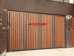 Mẫu cổng 4 cánh ốp nhựa giả gỗ ngoài trời - Phối hoa văn cắt CNC thiết kế hiện đại