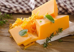 Phô Mai Cheddar màu CAM Yellow Zelachi nguyên khối - Cục 100gr (5102NVCR)
