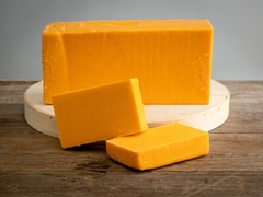 Phô Mai Cheddar màu CAM Yellow Zelachi nguyên khối - Cục 100gr (5102NVCR)