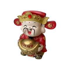 TƯỢNG THẦN CẦM THỎI VÀNG