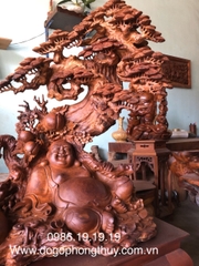 Tượng di lặc ngồi gốc Tùng Gỗ Hương Gia lai