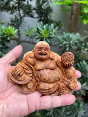 Tượng di lặc để ô tô gỗ Nu Ngọc Am